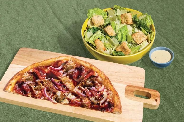 Meat Eater Half 11-inch Pizza + choice of side