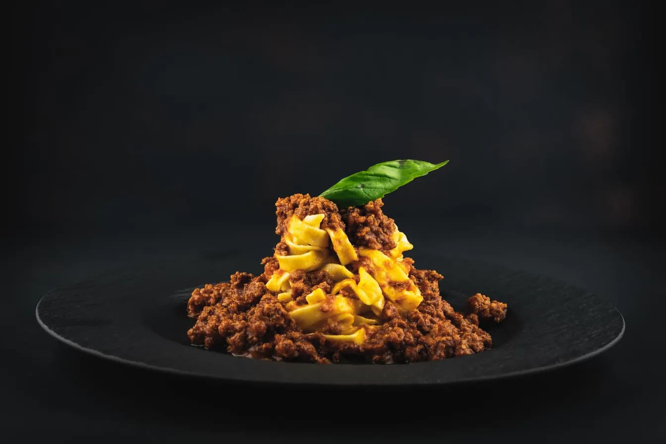 Duck Egg Bolognese